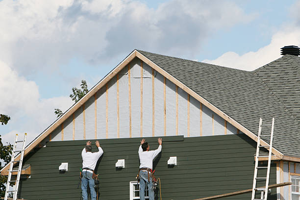 Professional Emergency Siding Repair technician working in Watertown, MA